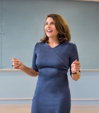 LIsa Richey speaking to a group